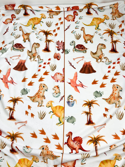 Couverture magiks - Dinos et oeufs rose pour toddler (Erreur d'impression)