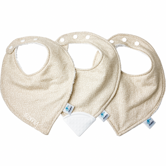 Bavoir - Motifs beige pâle